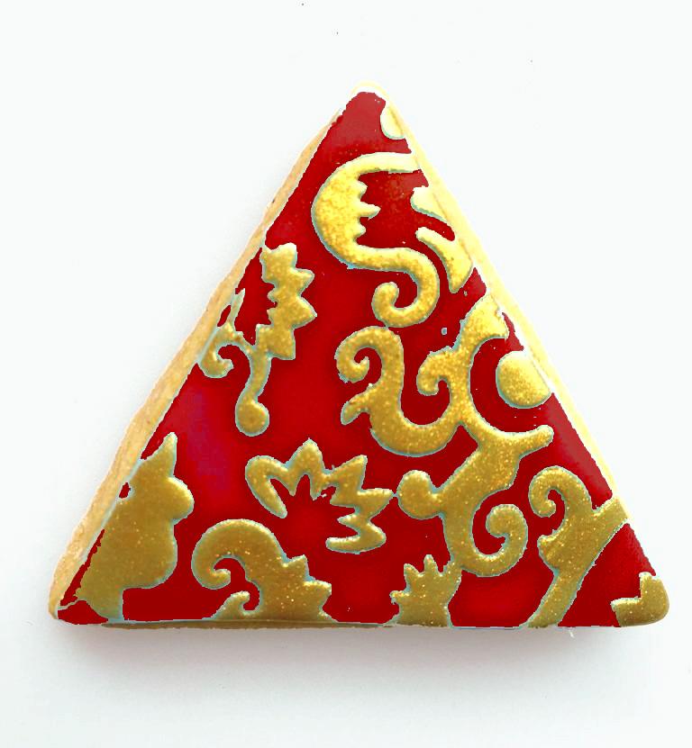 glitzerkeks dreieck rot mit goldenen Ornamenten